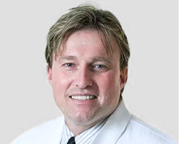 Dr. Guze - Periodontist